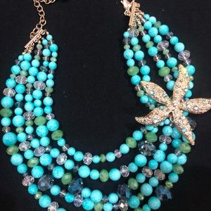 Statement jewelry. Turquoise blue and gold